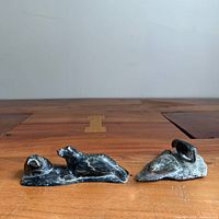 Both soapstone seal sculptures side by side
