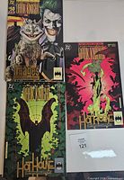 Front covers of all three comics showing titles and artwork