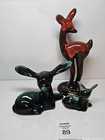 All three deer figurines grouped together