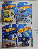 All four blister-card Hot Wheels cars