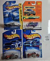 All four mint-on-card vehicles