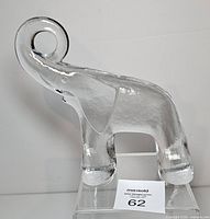 Front left view of clear glass elephant figurine