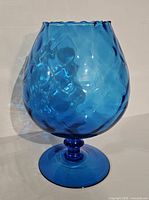 Full view of blue Empoli brandy snifter