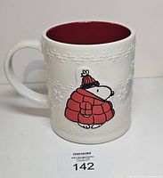 Front view of white ceramic Snoopy mug