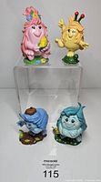 Front view of all four Snugglebums figures
