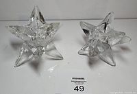 both starburst glass candleholders front view with lot tag