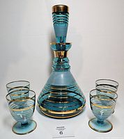 full set showing decanter with stopper and six glasses
