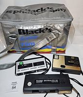 Overview of three cameras and Black's bag
