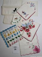 All seven handkerchiefs laid out