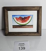 Front view of framed watercolor painting