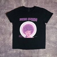Front view of black T-shirt with Aretha Franklin graphic