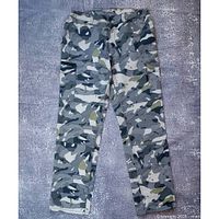 Full front view of grey woodland camouflage cargo trousers