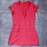 Full view of red Lole dress front showing style, pockets, neckline, sleeve length