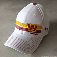 Full view of white New Era 39THIRTY Washington Commanders hat