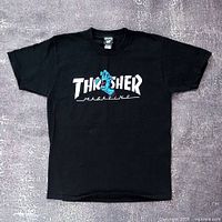 Full front view of black Thrasher Screaming Hand T-shirt