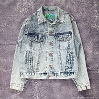 Front view of acid wash denim jacket