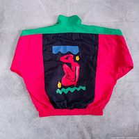 Back view of windbreaker showing large multicolour graphic