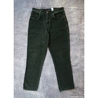 Full view of green corduroy jeans front side