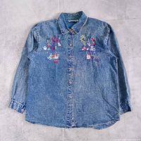 Full front view of denim shirt showing embroidery and overall condition