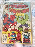 Front cover of bagged comic showing title, characters and bright colors