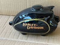 Left side view showing Harley-Davidson logo and gold trim
