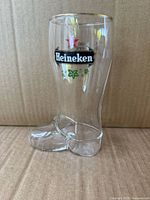 Full view of boot-shaped Heineken glass