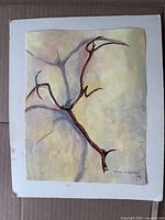 Full view of painting showing branch on canvas mounted to white board