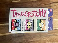 Tamagotchi box front with logo and graphics