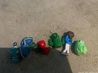 All six figurines aligned on carpet front view