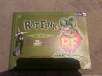 Front cover showing title, Rat Fink character and publisher logo