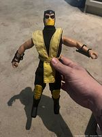Front view of Scorpion action figure showing costume and articulation