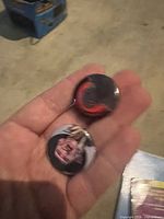 Front view of both Freddy portrait buttons