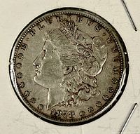 Obverse of 1878 Morgan silver dollar showing Liberty head and date