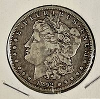 Obverse of 1892-O Morgan silver dollar