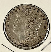 Obverse of 1896-O Morgan dollar in holder