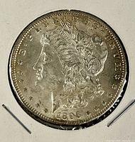 Obverse of 1896 Morgan silver dollar showing Liberty head and date