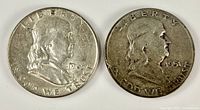 Obverse view of both Franklin half dollars (1963-D left, 1951-D right) showing date, portrait, and condition