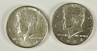 Obverse of both 1964-D Kennedy half dollars side by side