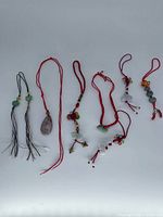 All seven charms laid out for overview