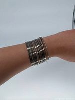 Bangles stacked on wrist showing appearance when worn
