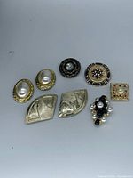 Group of eight assorted vintage button covers