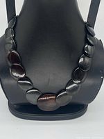 Front view showing entire necklace, bead shape and colour