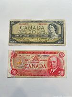 Fronts of $20 (1954) and $50 (1979) Bank of Canada notes