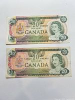 Fronts of both 1979 $20 banknotes showing portrait and denomination