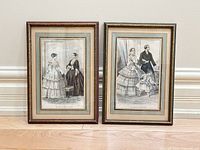 Both framed prints side by side