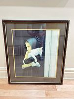 Front view of framed print showing artwork, matting and frame