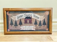 Front view of framed print showing artwork, frame and glass