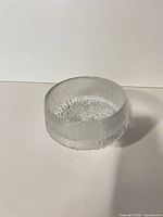 Full view of clear textured glass bowl