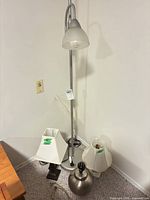Overview of floor lamp, two table lamp bases and two shades