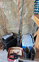 Group shot of rods, bag, cooler, boots, box of accessories